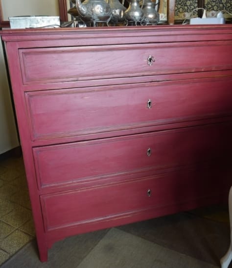 Red lacquered chest of drawers