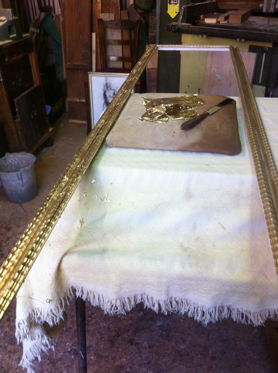 Golden frame Jane Harman storage and furniture restoration in Florence